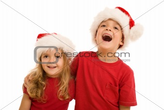 Laughing christmas kids looking aside