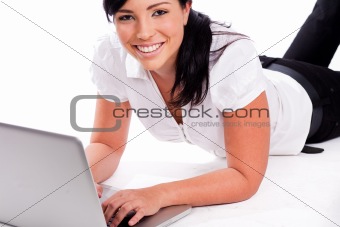 Young happy business woman working with the laptop