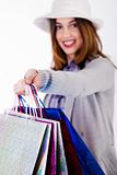 Women showing her shopping bags after her purchase is over