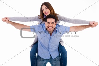 Front view of a couple in piggy back ride