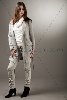 young brunette model with her spring coat