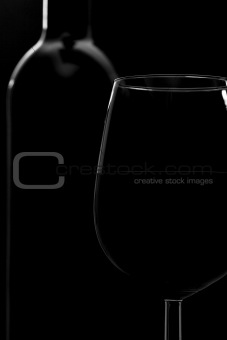 Glass of Wine and Wine Bottle