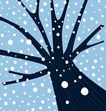 Winter tree with falling snow