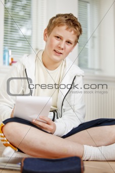 Teenage boy doing his homework