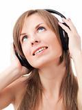 Girl with headphones listening to musicto music