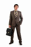 Businessman in suit holding briefcase.