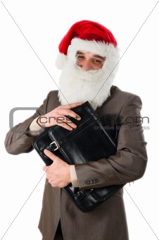 Businessman in suit with santa hat on head. 