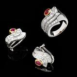 Two silver earrings and ruby ring 