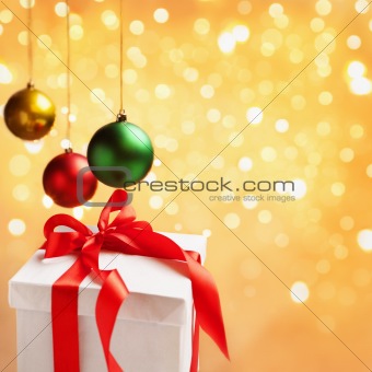 Single Christmas pattern with ornaments on golden background