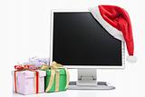 Computer, Santa hat and gifts
