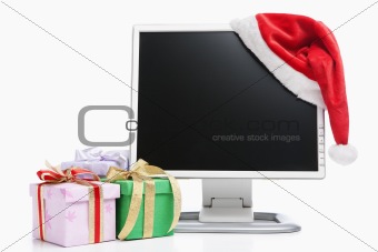 Computer, Santa hat and gifts