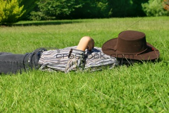 Child asleep in the grass