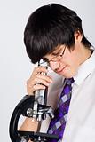 boy with microscope