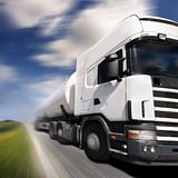 truck driving on country-road/motion blur