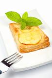 Fork and apple tart on a dish