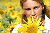 Beautiful sunflower woman in the sun