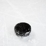 Hockey puck on ice.
