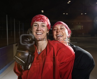 Female hockey players.