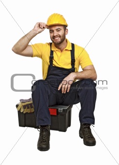 handyman sit on his toolbox