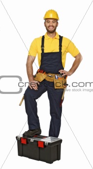 young manual worker with toolbox