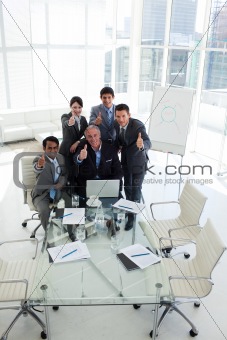 International business team with thumbs up