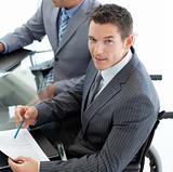 Close-up of a caucasian businessman in a wheelchair 