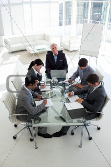 Business people showing diversity in a meeting