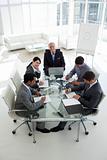 High angle of a business team sitting around a conference table