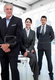Businesswoman and her colleagues in a row 