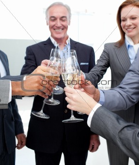 Cheerful business team celebrating a success 