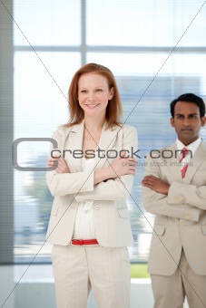 Businessman with folded arms standing
