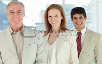 Smiling business people in a row