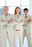 Business team with folded arms standing