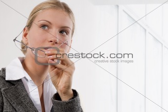 Portrait of an attractive young businesswoman with glasses