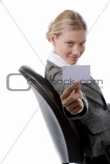 Beautiful business woman showing a blank card