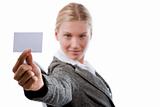 Beautiful business woman showing a blank card
