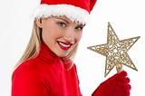 Beautiful Santa girl on white holding a Christmas star