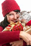 Happy, Attractive Woman Holds Holiday Gifts Isolated on a White Background.