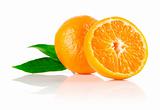 fresh mandarine fruit with cut and green leaves