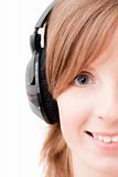 Face of girl listening music. Front view