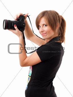 Young woman with photo camera