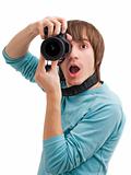 Young man surprised with photo camera