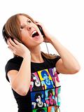 Girl yelling song wih headphones
