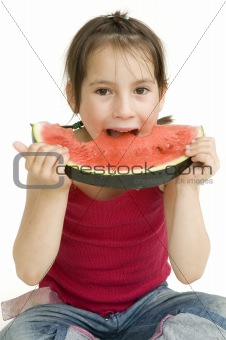 little girl eating watermelon