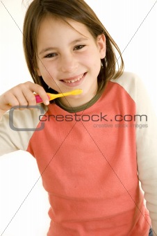 girl brushing his teeth