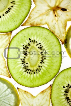 Sliced Kiwifruit, Lemon and Starfruit isolated on white