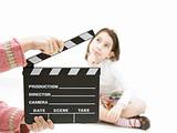 girl with a movie clapper
