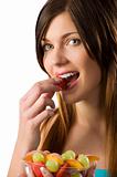 girl eating fruit