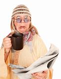 Crazy new age woman in a yellow robe with coffee