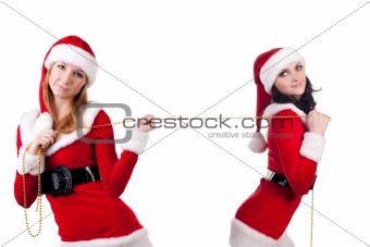 Two sexual girls in Christmas clothes .